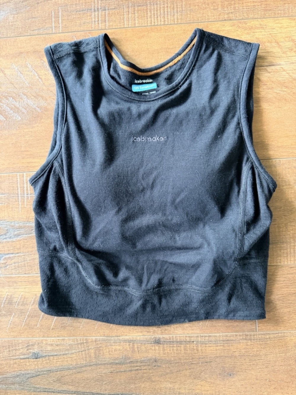 Icebreaker Black Crop Tank with Orange Neck Trim